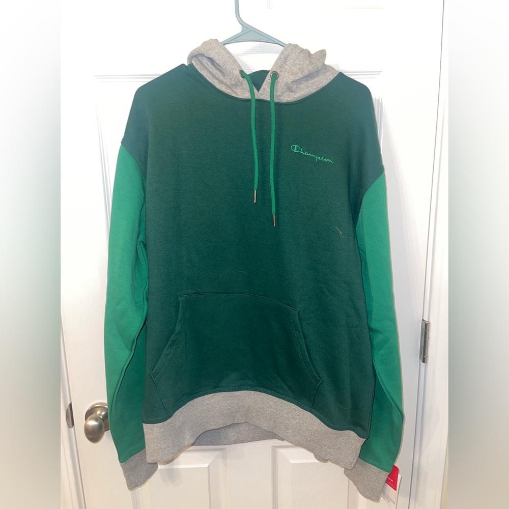 Multi-color champion sweater. Brand new with tags!